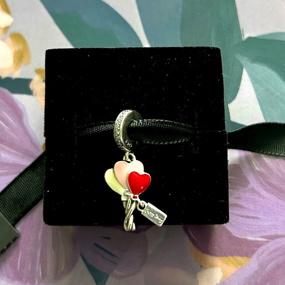 Pandora B-day balloon charm, still in box and never used.